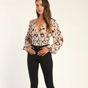 Lulus Romantic Impression
Black Floral Print Smocked
Long Sleeve Top